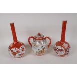 A pair of Japanese Satsuma specimen vases, 8" high, and a Satsuma porcelain sugar jar painted with