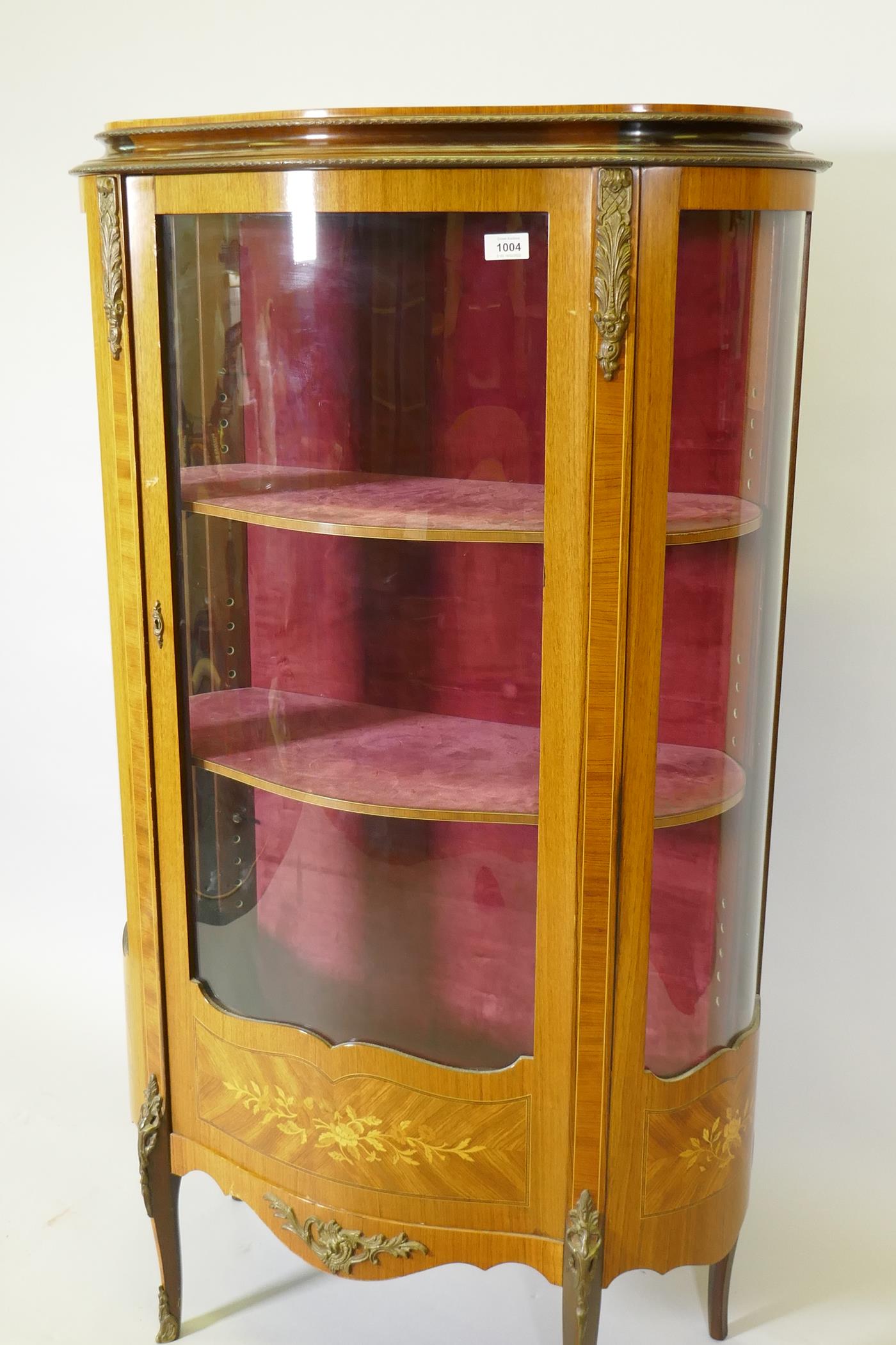 A French mahogany vitrine with tulipwood banded inlay, brass mounts and serpentine front, raised - Image 2 of 4