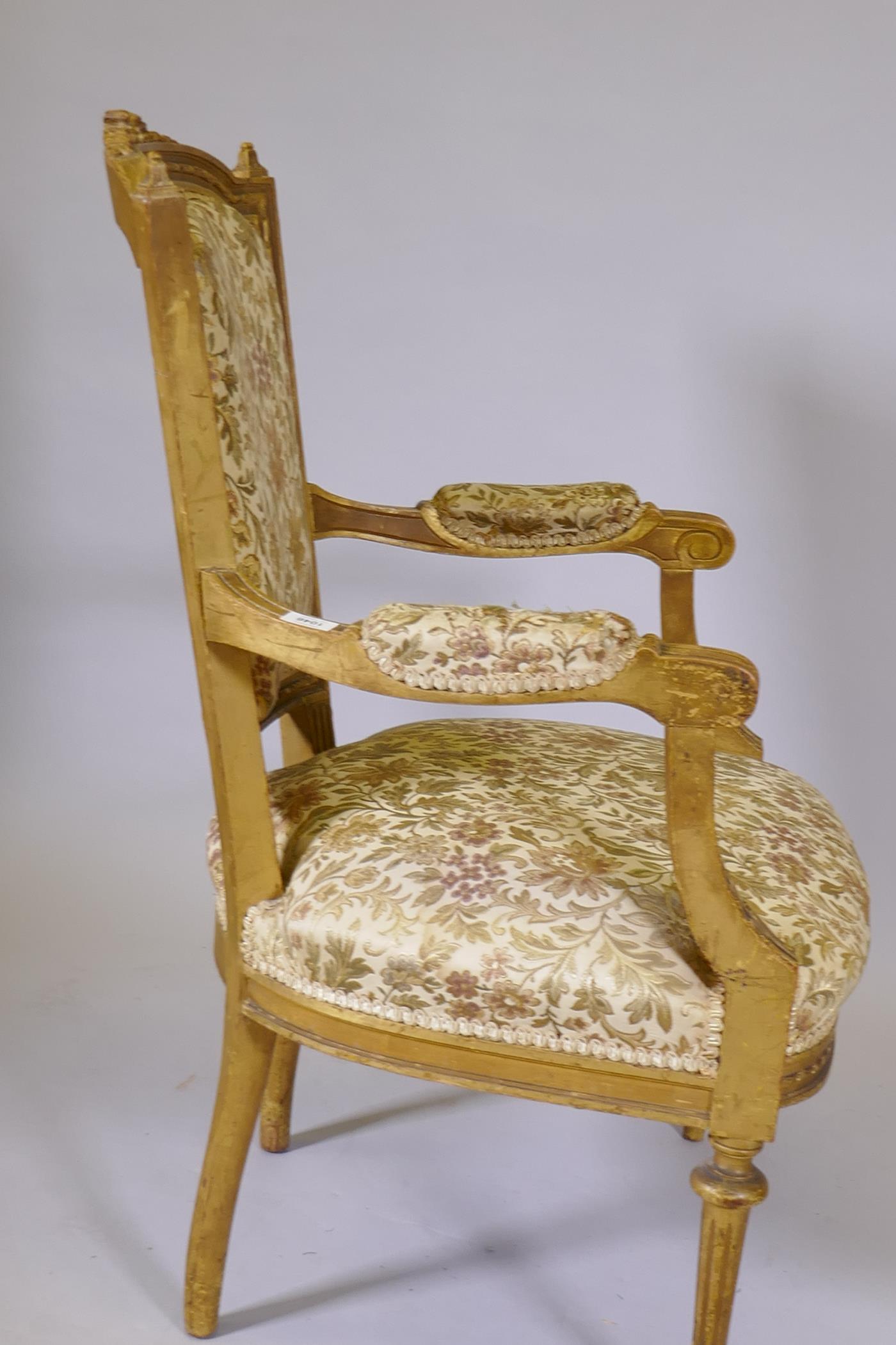 An antique French giltwood open armchair, the shaped back with carved and pierced detail, raised - Image 4 of 4