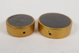 A brass mounted horn pendant/bead, and another smaller, 1" largest
