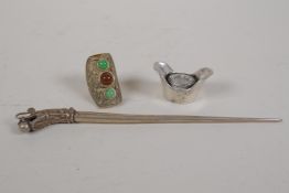 A Chinese white metal hairpin with dragon head decoration, a white metal ring set with semi precious