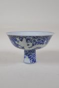 A Chinese Ming style blue and white porcelain stem bowl with incised dragon decoration, Xuande 6