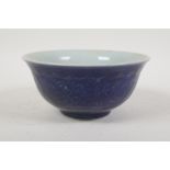 A powder blue glazed porcelain rice bowl with underglaze scrolling decoration, Chinese Xuande 6