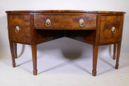 A George III inlaid mahogany 'D' shaped sideboard with single drawer and four cupboard doors, raised
