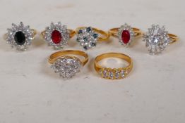 Seven yellow metal and past set dress rings