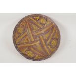A Moorish earthenware bowl painted with geometric designs, 9" diameter