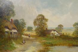 F.E. Jamieson, figures in an extensive landscape, signed oil on canvas, 20" x 30"