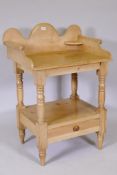 A C19th pine washstand with galleried top and base drawer on turned supports, 38½" x 27" x 19½"