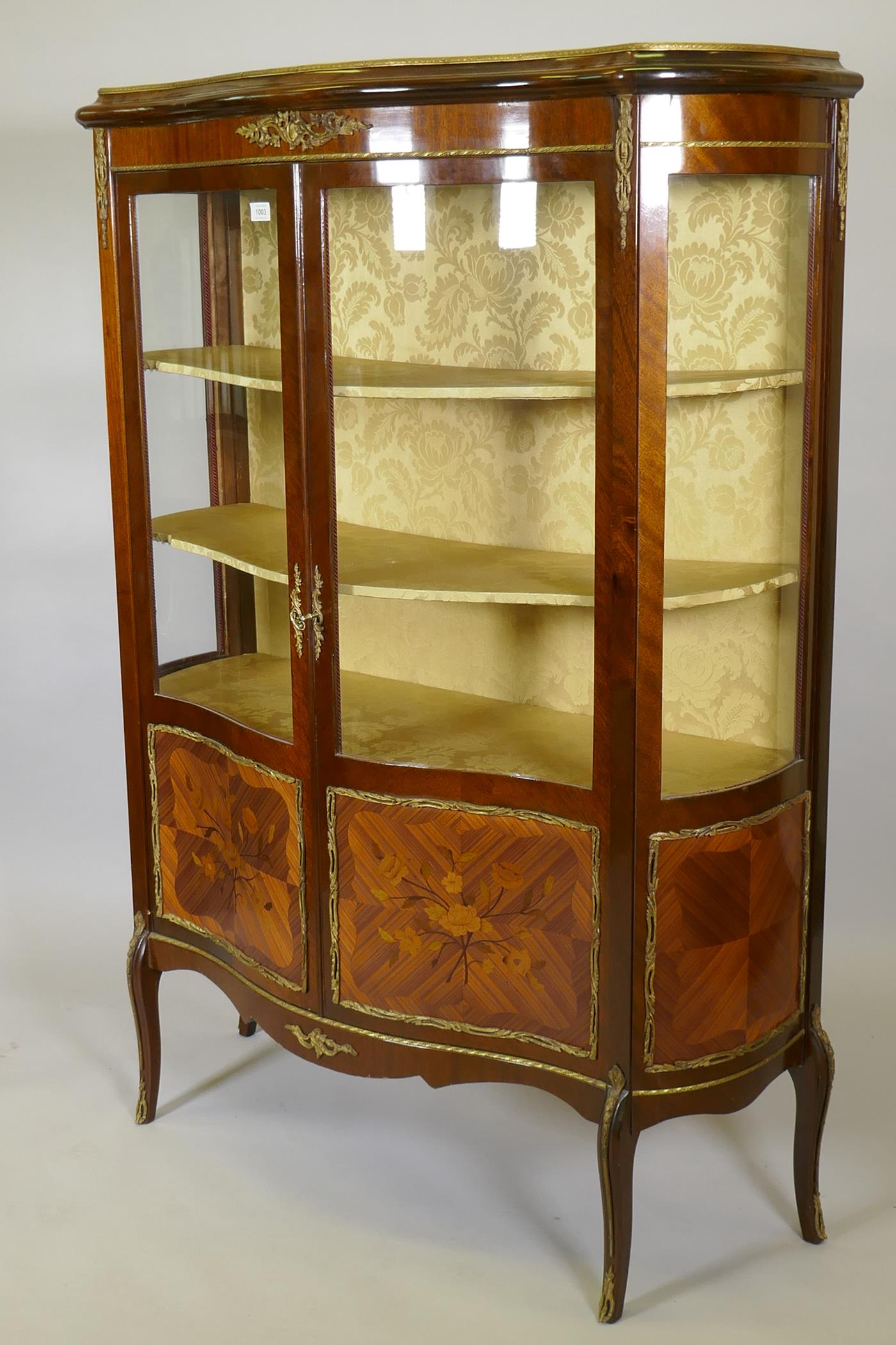 A French marquetry inlaid mahogany serpentine front vitrine with brass mounts, the interior with - Image 3 of 6