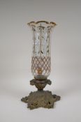 An antique Bohemian glass and bronze storm light, with frilled rim and gilt and enamelled