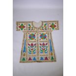 An Islamic linen robe with all over hand painted calligraphy decoration 41" long