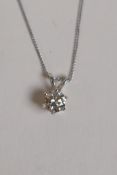 An 18ct white gold diamond pendant necklace, approx 40 points