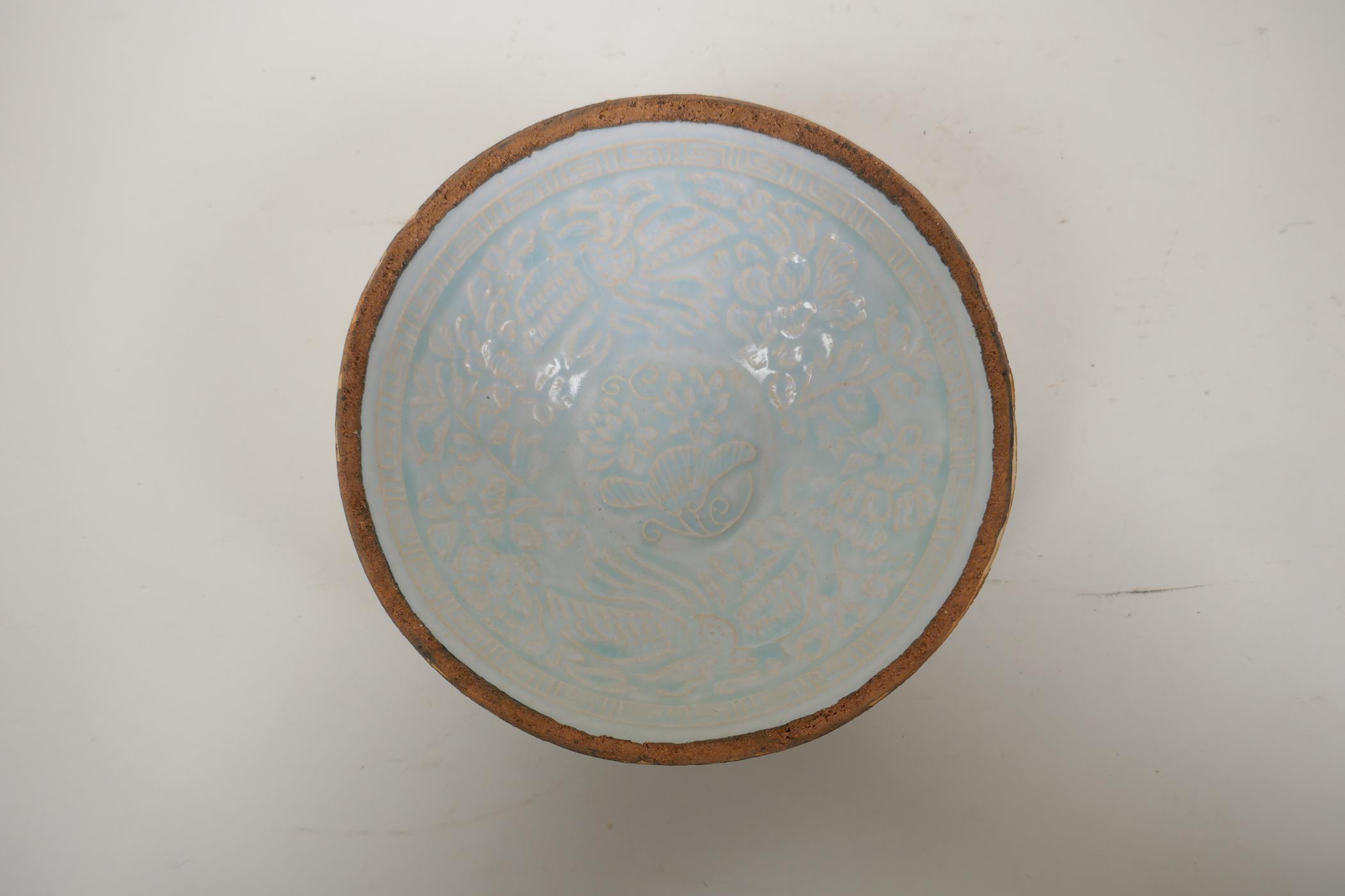 A Song style celadon glazed porcelain bowl with underglaze phoenix and lotus flower decoration, 7" - Image 4 of 7