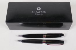 Two Sheaffer ball point pens and presentation box
