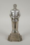 A Chinese white metal figure of Chairman Mao, 7" high
