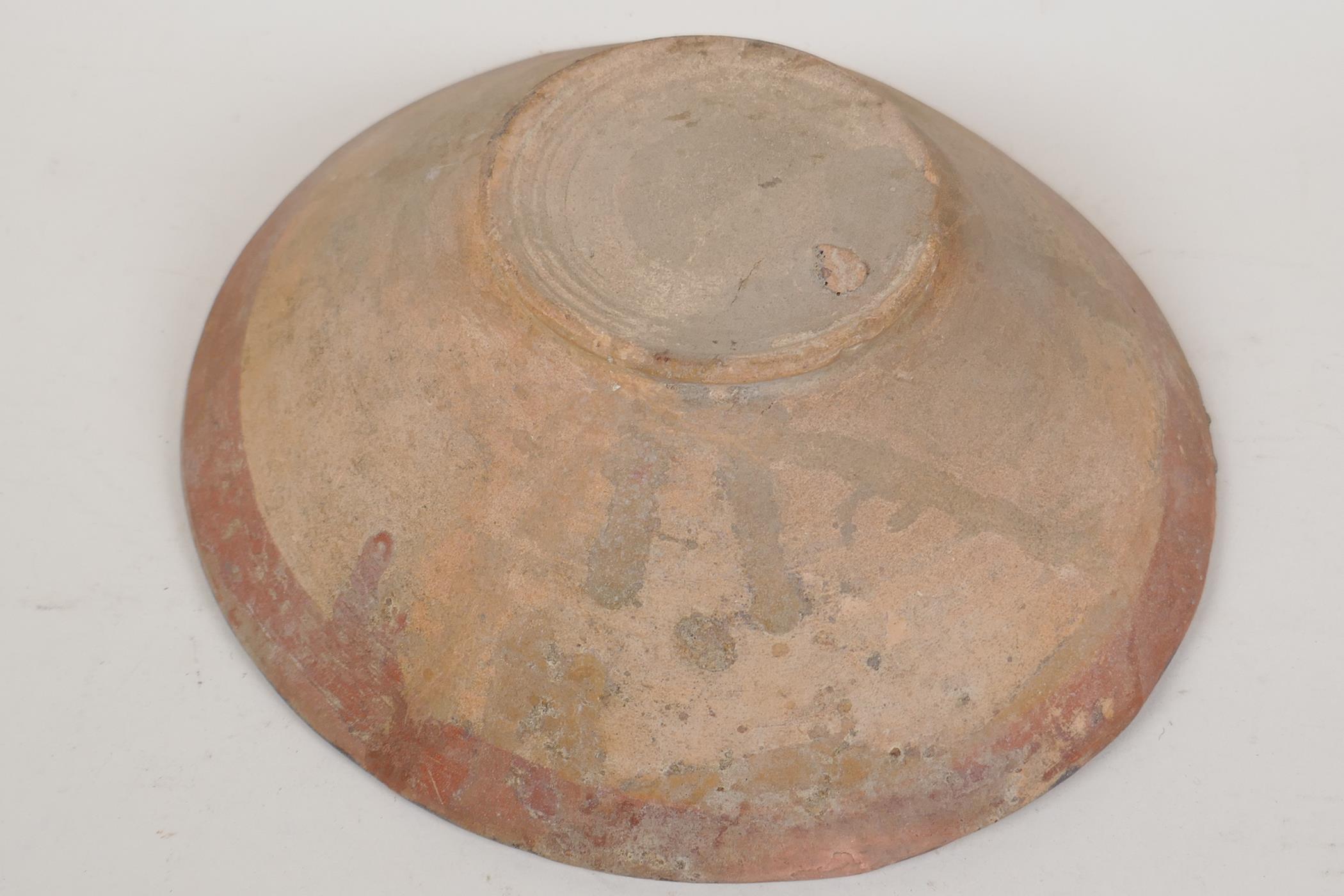 A Moorish earthenware bowl painted with geometric designs, 9" diameter - Image 3 of 3