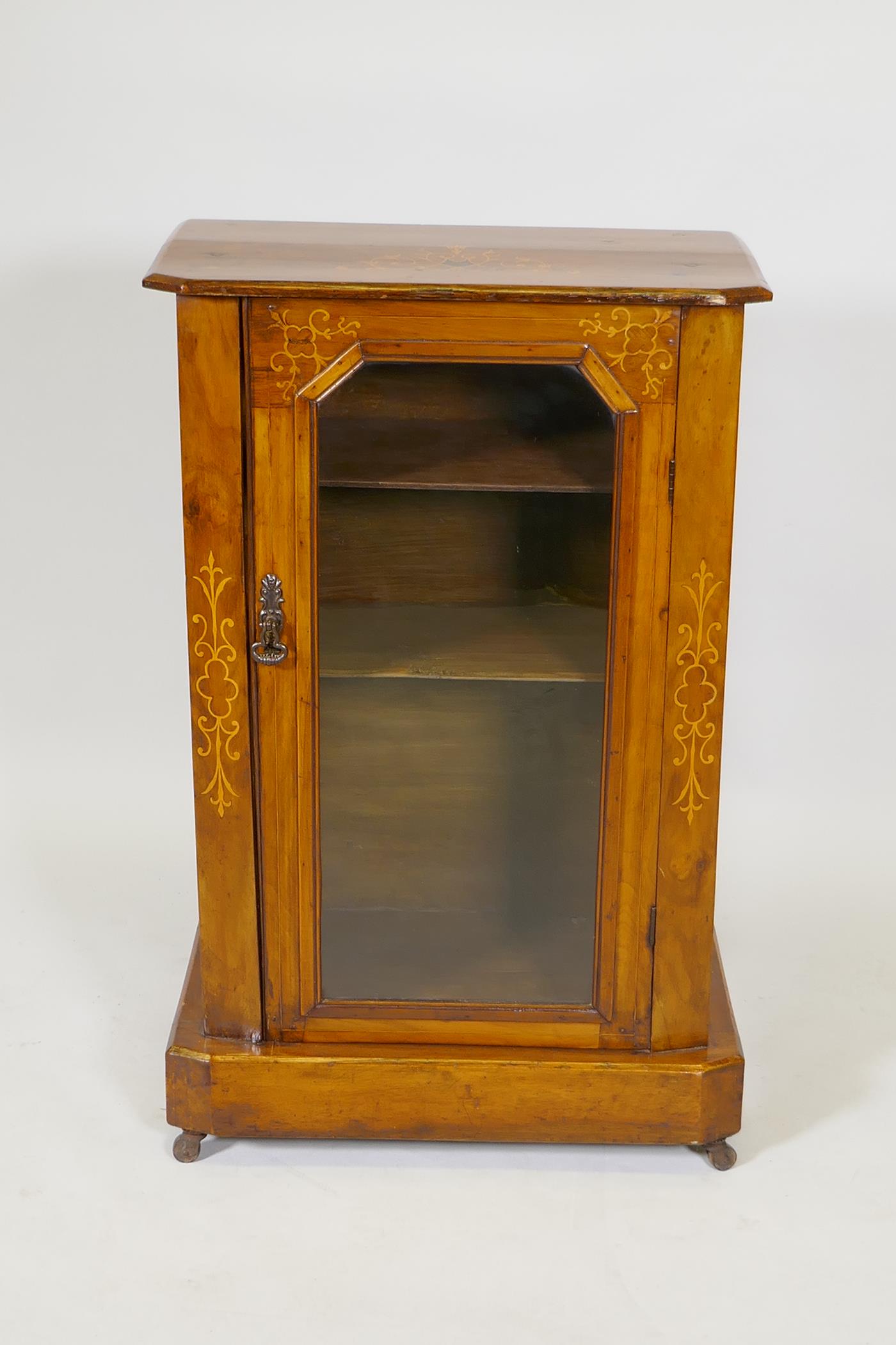 A Victorian inlaid walnut display cabinet with canted corners and single glazed door, raise on a - Image 3 of 5