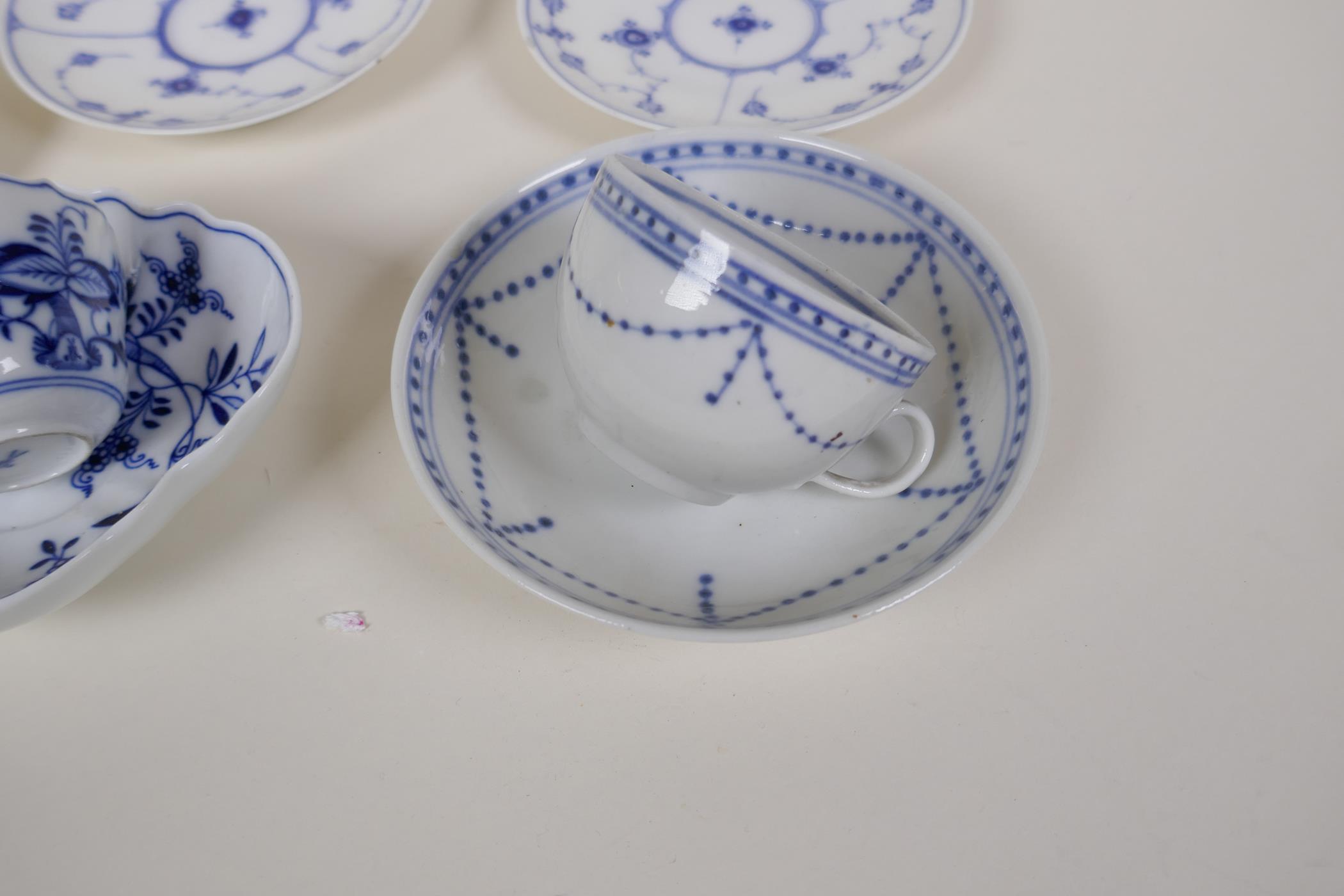 A Meissen onion pattern blue and white porcelain petal shaped cup and saucer, AF, an early - Image 3 of 9