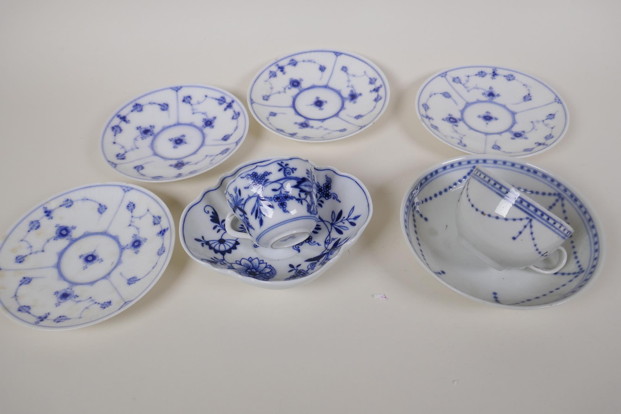 A Meissen onion pattern blue and white porcelain petal shaped cup and saucer, AF, an early - Image 2 of 9