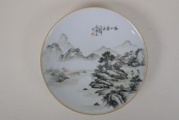 A Chinese monochrome porcelain cabinet plate decorated with a riverside landscape scene, inscription