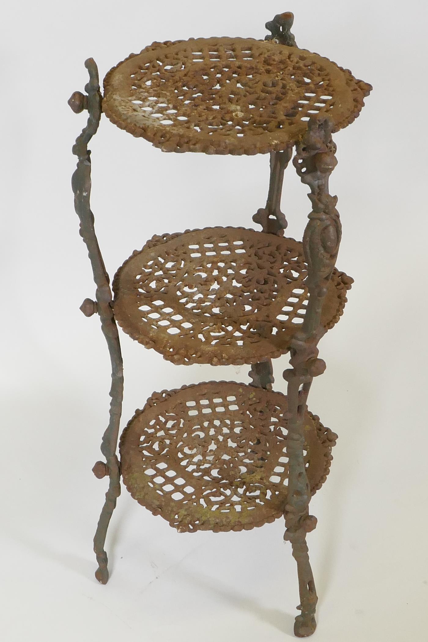 A cast iron three tier garden pot stand on cast supports, 26" high, AF - Image 3 of 5