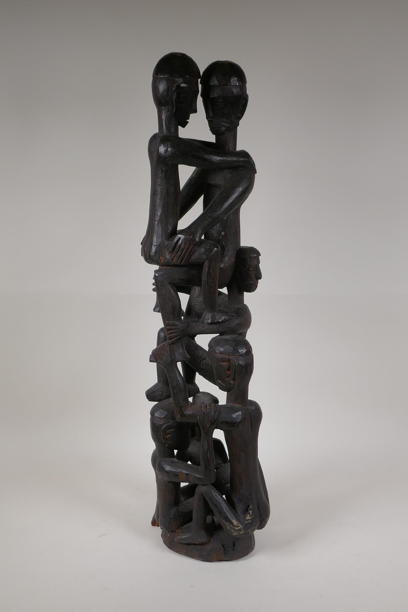 A Philippino Ifugao carved hardwood figure group, 26" high - Image 2 of 8