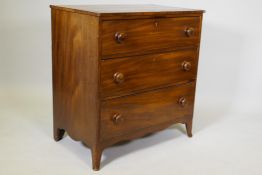 An early C19th mahogany chest of three drawers, raised on swept supports, 34" x 20" x 35½"