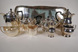 A silver plated gallery tray with pierced decoration, 24½" x 9½", an Art Deco four piece silver