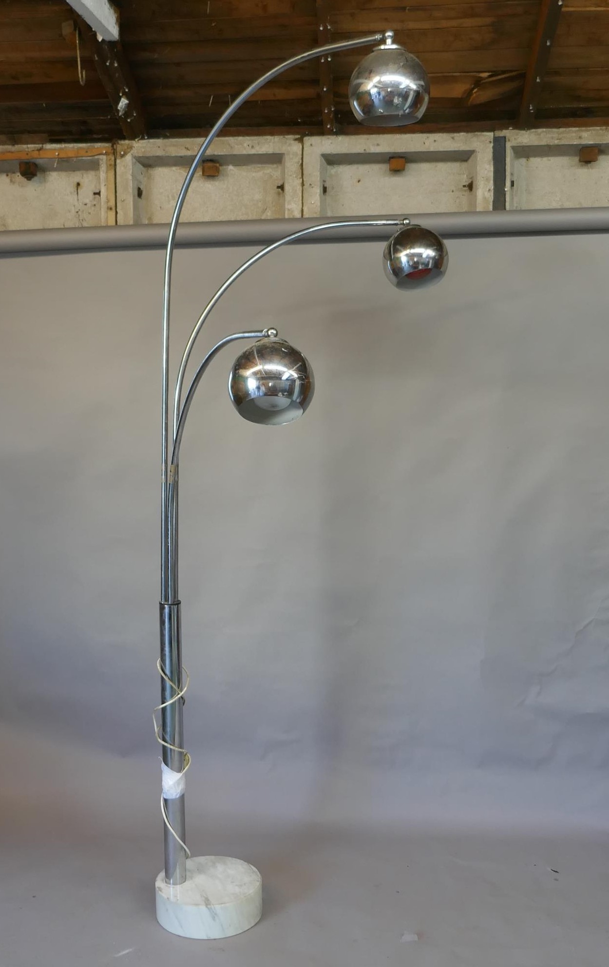 A 1970s/80s chrome three branch standard lamp with a marble base, 91" high