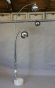 A 1970s/80s chrome three branch standard lamp with a marble base, 91" high