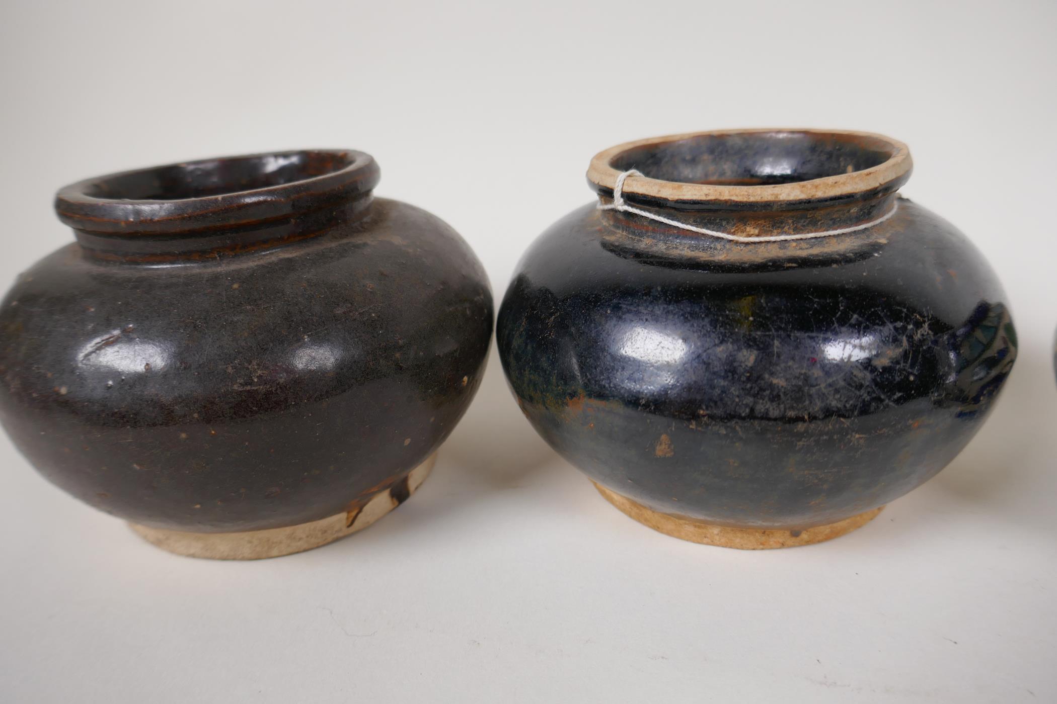 Two Indian pottery squat jars, a similar eastern jar and a vase, 4" high - Image 6 of 6