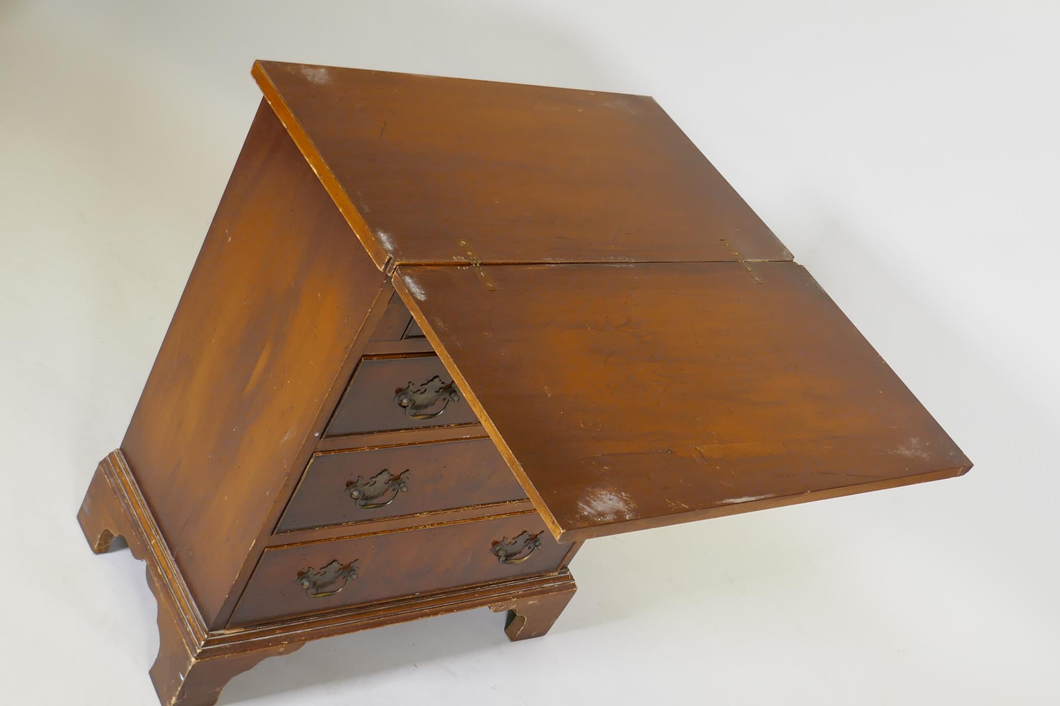 A yew wood veneered bachelor's chest, with fold out top over four drawers, raised on bracket - Image 5 of 7