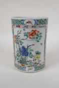 A famille vert porcelain brushpot with decorative panels depicting butterflies and flowers,