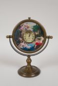 A brass desk clock/desk mirror decorated with classical female nudes, 7½" high