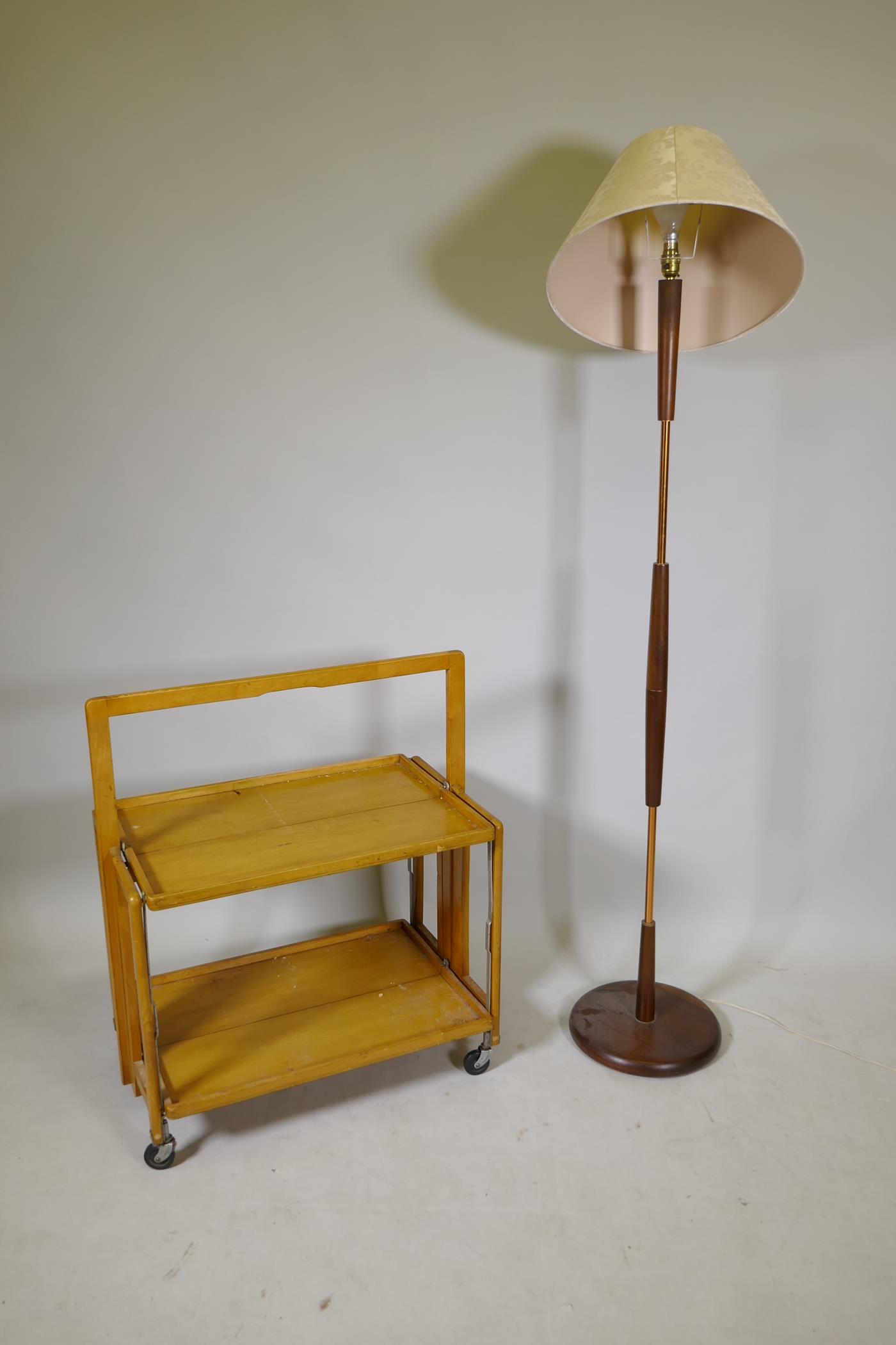 A 1970s teak and copper standard lamp, and a Haxyes beech folding hostess trolley, lamp 59" high