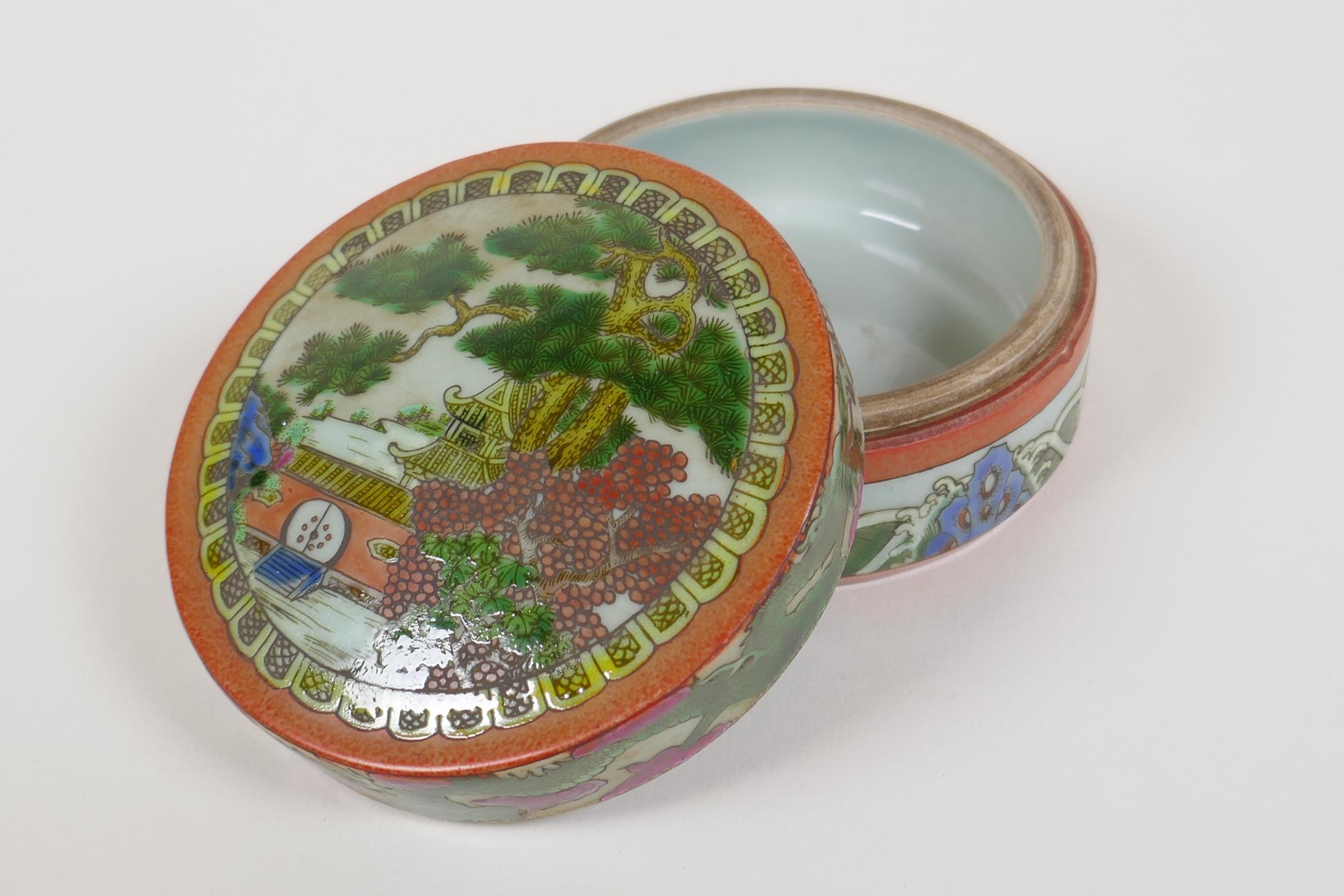 A famille vert porcelain cylinder box and cover, decorated with a landscape scene, dragons and the - Image 4 of 12