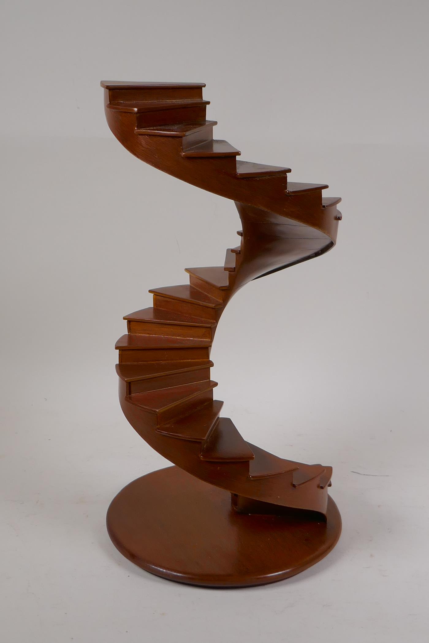 An architectural model of a spiral staircase, 14" high