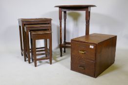 An early C20th oak two drawer filing cabinet, a 1930s oak occasional table, and a nest of three ori