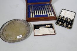 A set of six cased hallmarked silver coffee bean spoons, a cased set of silver plated knives and