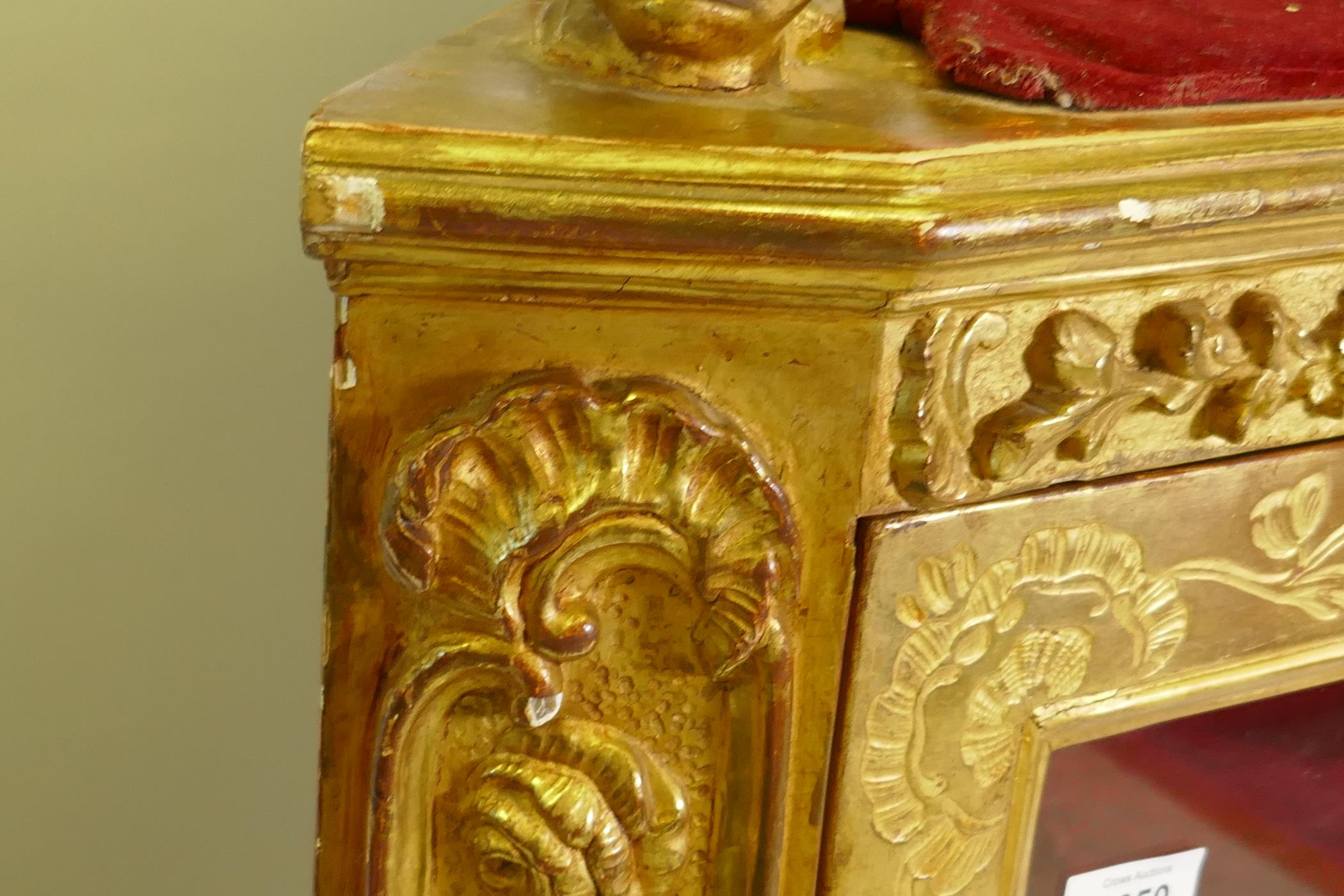 A C19th Italian giltwood corner cabinet, the top with an open shelf supported by dolphins, the - Image 9 of 11