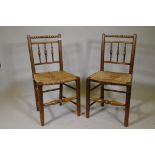 A pair of bobbin turned ash side chairs with woven rush seats