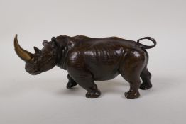 A bronze rhinoceros, 9" long