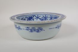 A Chinese Republic period blue and white porcelain steep sided bowl, decorated with figures in a