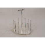 A Christopher Dresser design silver plated toast rack, 6" high