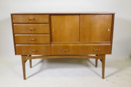 A 1960s Nathan veneered teak sideboard, 48½" x 17½", 35" high