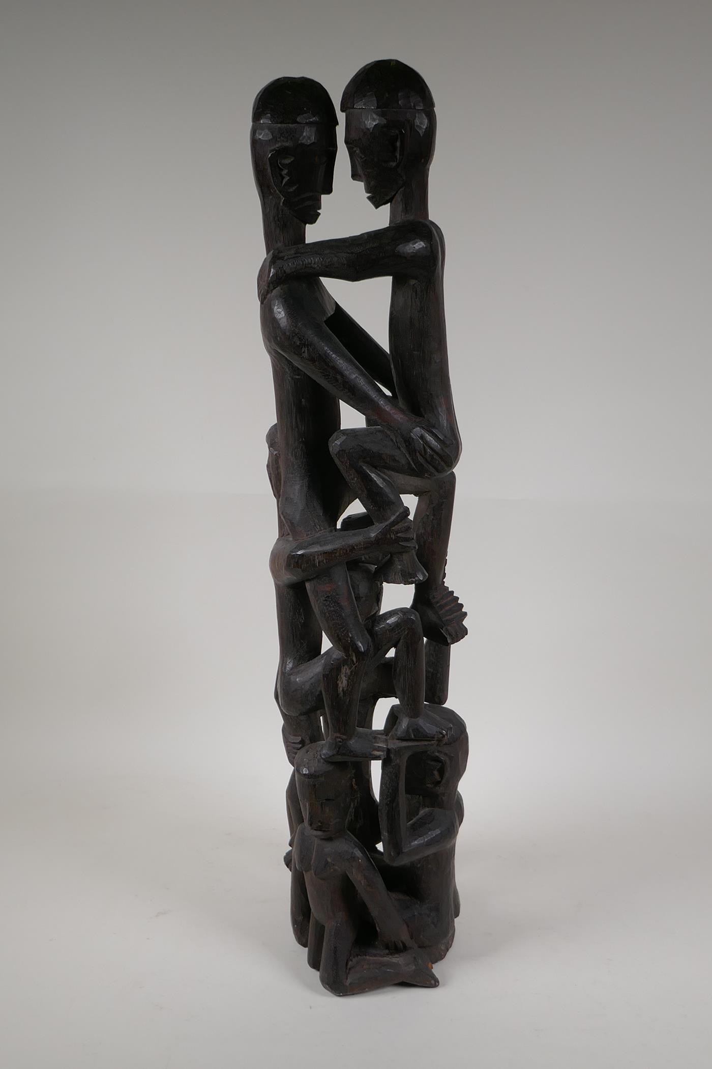 A Philippino Ifugao carved hardwood figure group, 26" high - Image 4 of 8