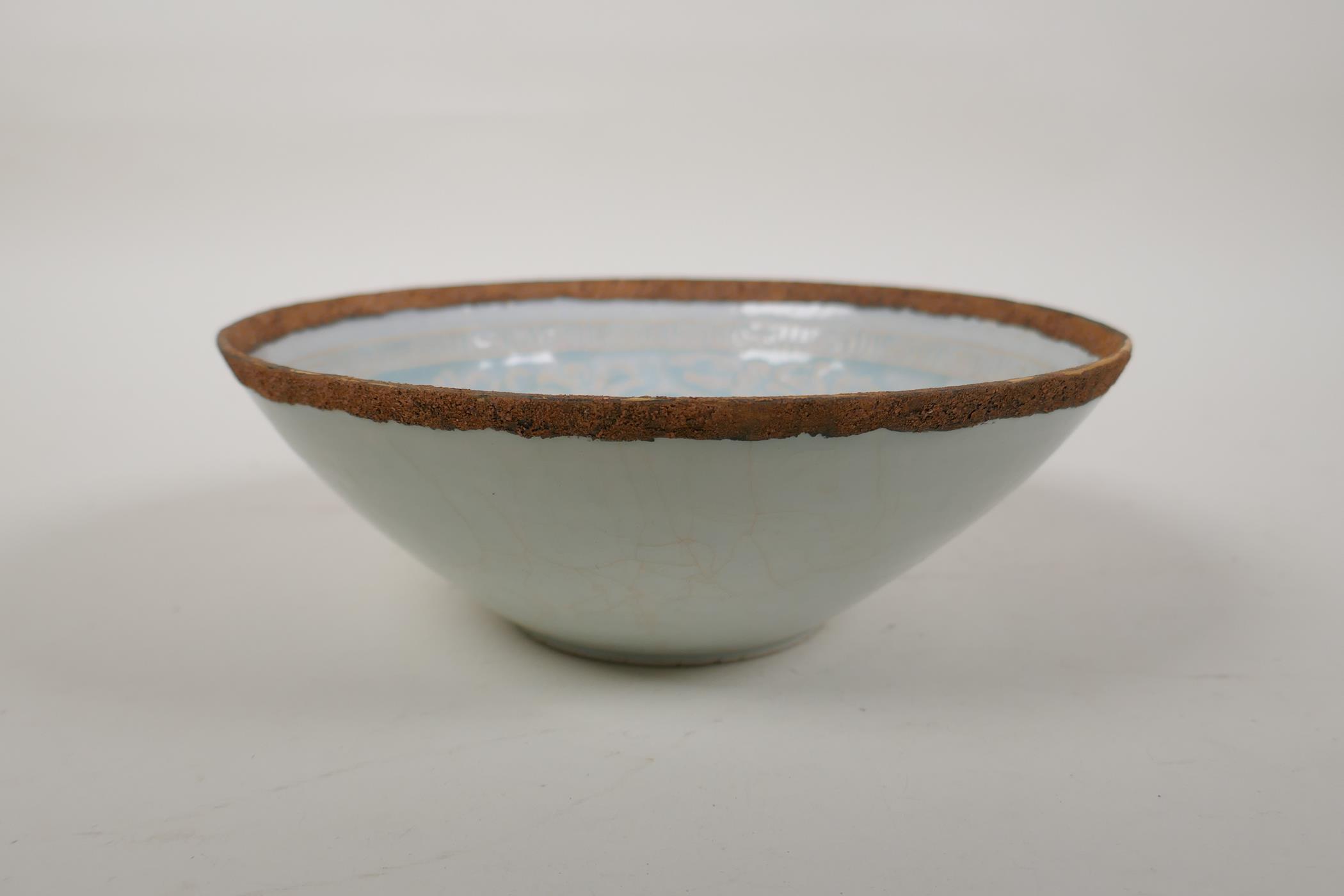 A Song style celadon glazed porcelain bowl with underglaze phoenix and lotus flower decoration, 7" - Image 2 of 7