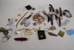 A quantity of costume jewellery and wrist watches including Rotary, and pen knives, key rings etc