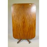 A George III mahogany tilt top breakfast table with banded ebony inlay, 40" x 60", 28" high