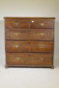 An C18th oak 'garret' chest in two sections, two drawers over three long, raised on bun feet, 43"